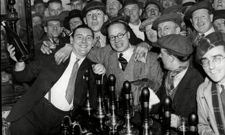 Alex Jackson in the pub he managed, the Angel & Crown Inn on St Martin's Lane, in 1934.