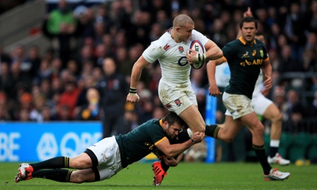 Mike Brown is well tackled by Cobus Reinach. England have the vast majority of the possession but are not creating too much.