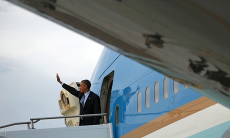 Barack Obama boards Air Force One as he leaves Brisbane at the end of the G20 summit.
