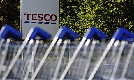 Trolleys lined up at a Tesco supermarket