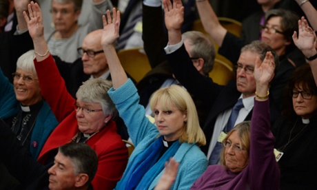 Clergy cast votes in favour of women bishops at the Anglican General Synod in Church House, London