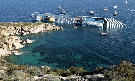 Costa Concordia on its side after running aground off the Tuscan island of Giglio.