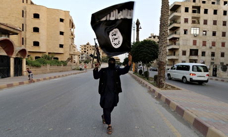 Man waving Islamic State flag in Syria