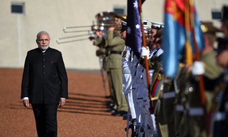 Indian Prime Minister Narendra Modi receives a ceremonial welcome at Parliament House in Canberra, Tuesday, Nov. 18, 2014.