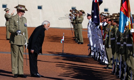India's Prime Minister Narendra Modi bows as he participates in a welcoming ceremony at Parliament House in Canberra November 18, 2014.
