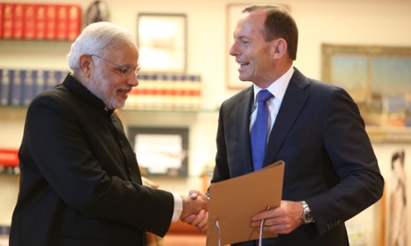 The Prime Minister of the Republic of India Narendra Modi at a bi-lateral meeting with Prime Minister Tony Abbott in Parliament House Canberra this morning, Mr Modi gave Mr Abbott an historical document from the 19th century-Tuesday 18th November 2014.