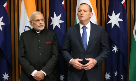 The Prime Minister of the Republic of India Narendra Modi and Prime Minister Tony Abbott at the signing of an MOU in Parliament House Canberra this morning, Tuesday 18th November 2014.
