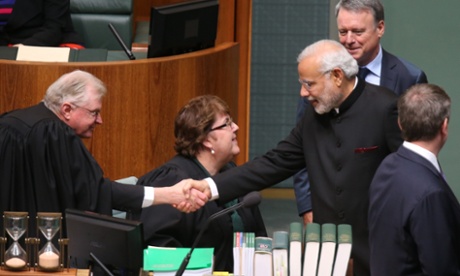 The Prime Minister of the Republic of India Narendra Modi greets the Reps Clerks after addressing a joint sitting of Parliament in Canberra this morning, Tuesday 18th November 2014.