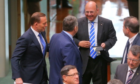 Prime Minister Tony Abbott and Treasurer Joe Hockey chat with senator Sinodinos before a joint sitting of Parliament in the Reps chamber in Parliament House Canberra this morning for The Prime Minister of the Republic of India Narendra Modi! Tuesday 18th November 2014.
