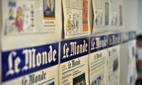 Pages of Le Monde newspaper
