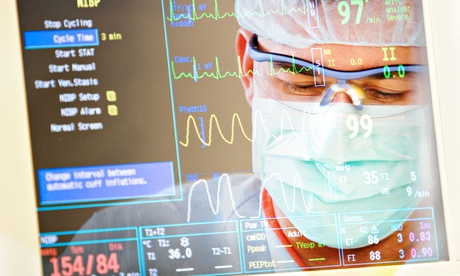 Montage of surgeon and monitor readout of vital signs