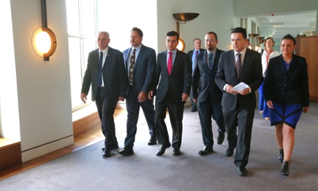Senators John Madigan, Peter Wish-Wilson, Sam Dastyari,  Ricky Muir, Nick Xenephon and Jacqui Lambie on their way to a press conference in the mural hall of Parliament House Canberra this morning, Wednesday 19th November 2014.