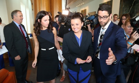 Senator Jacqui Lambie leaves a press conference in the mural hall of Parliament House Canberra this morning, Wednesday 19th November 2014.