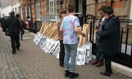 Placards outside UCL ahead of the demo.