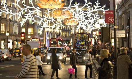 Shoppers in a festive Regents Street