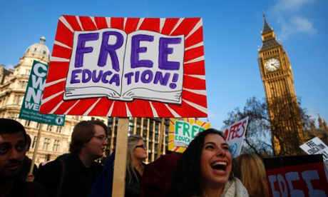 Demonstrators pass the Houses of Parliament as they participate in a protest in favour of free education.