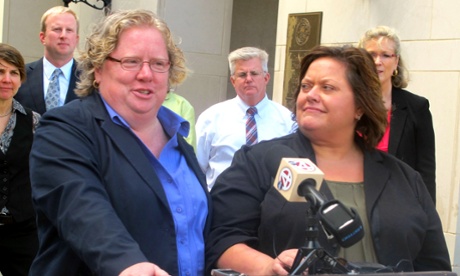 Colleen Condon, left, and her partner Nichols Bleckley were among the first six couples to pick up their license.