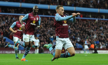 Weimann launches into a knee slide by the corner flag.