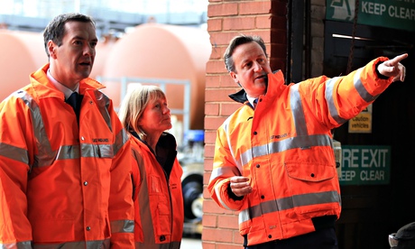 Chancellor George Osborne and PM David Cameron with Neville Hill Traincare Manager Linda Swain