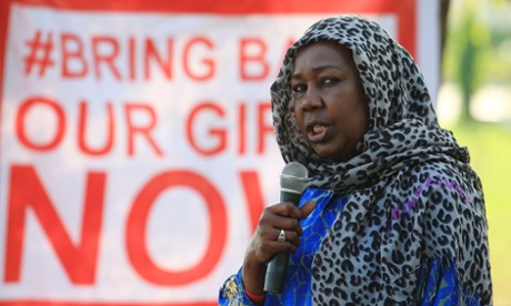 Campaigner from the 'bring back our girls' campaign addresses a rally calling for the release of girls taken by Boko Haram