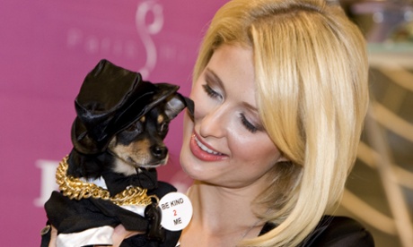 Paris Hilton with dog at a celebrity event in Montreal.