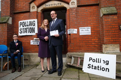 Mark Reckless arrives to vote with his wife, Catriona Brown, in the byelection in Rochester.