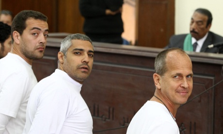 Baher Mohamed, Mohamed Fahmy and Peter Greste during their trial in Cairo.