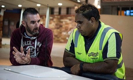 Cast member Trent with a community safety officer in Alice Springs.