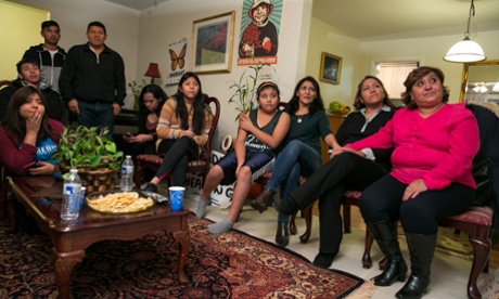 The Andrade and Vaca families watching President Obama addressing the countryBolivian families watching Obama for Dan Roberts piece
