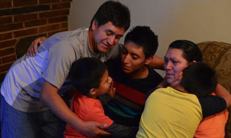 Pedra Ortega, 45, and his wife Maria, 48, undocumented immigrants from Ecuador, react with happiness after watching President Obama’s address at their home Thursday night.