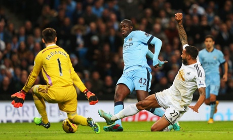 Yaya Toure powers through to put City ahead.