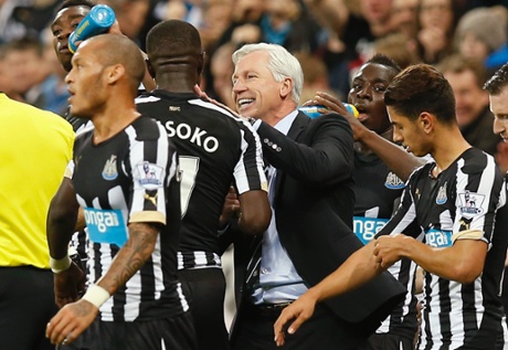 Alan Pardew celebrates with goalscorer Moussa Sissoko and Newcastle move up into the top four.