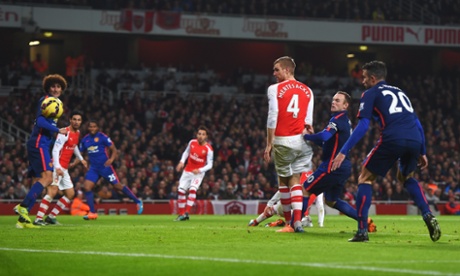 Kieran Gibbs scores an own goal to give United the lead.