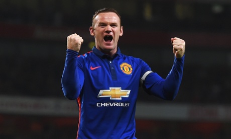 Wayne Rooney of Manchester United celebrates the own goal scored by Kieran Gibbs.