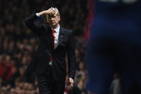 Arsene Wenger looks despondent at the Emirates.