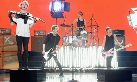 Michael Clifford, Luke Hemmings, Ashton Irwin and Calum Hood of 5 Seconds of Summer at the American Music Awards.
