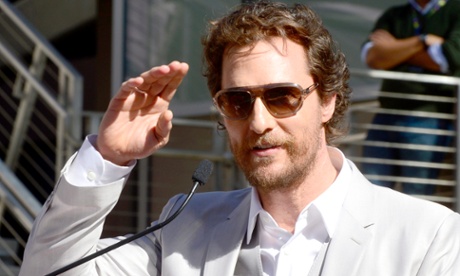 Matthew McConaughey salutes fans at the unveiling of his star on the Hollywood Walk of Fam, 17 November 2014.