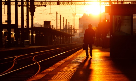man walking on rail platform