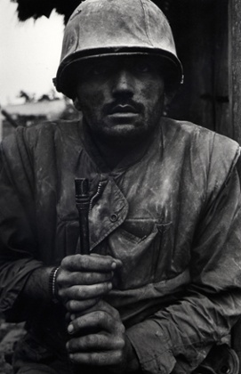 Shell-shocked US Marine, Vietnam, Hue, 1968. The Marine’s fixed gaze, barely registering the presence of the camera, testifies to the traumatic experience of combat.