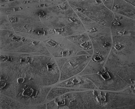 Fait #43, 1992. The aerial views of the desert landscape of Kuwait after the first Gulf War evoke the technology of modern warfare, which relies on surveillance, aerial bombardment and missile strikes.