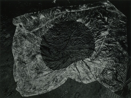 The Japanese National Flag, Tokyo, 1965. From the series The Map. One set of images from the photobook The Map shows the residual effects of the atomic bomb that were still visible when Kawada was photographing in Hiroshima from 1959 to 1961.