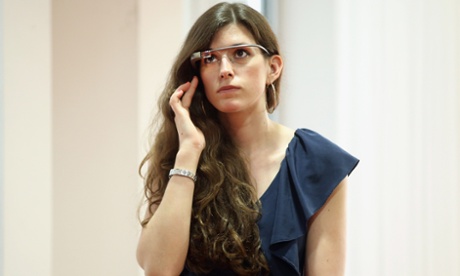 A woman using Google Glass