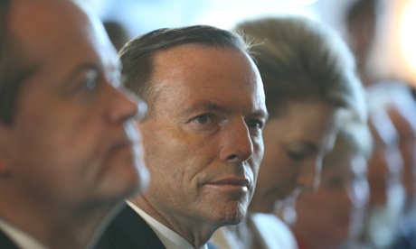 The Prime Minister Tony Abbott with Opposition Leader Bill shorten at a function to mark International Day for the elimination of violence against women.