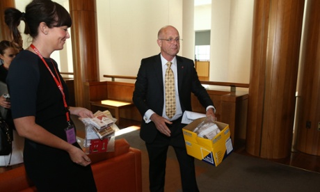 Senator David Leyonhjelm with a box of illegal tobacco products procured within range of parliament house.