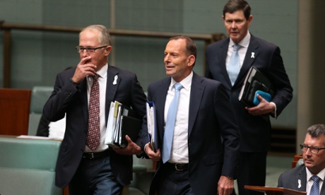 Tony Abbott with communications minister Malcolm Turnbull arriving for question time .
