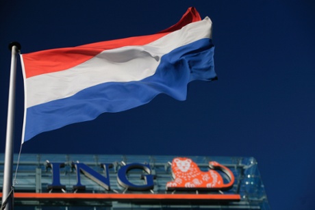 The Dutch flag flies outside the ING head office in Amsterdam, Netherlands,
