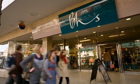 Shoppers pass retailer Bhs in Norwich.