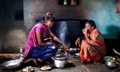 Lata cooking with her mother in the kitchen of her childhood home.