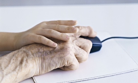 Child's hand and elderly man's hand