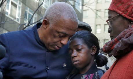 State Assemblyman-elect Charles Barron, left, and his wife city Inez Barron, flank Melissa Butler during a news conference outside the Brooklyn DA's office.
